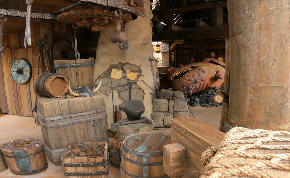 Detailed Viking blacksmith scene with a dragon inside Isle of Berk at Epic Universe