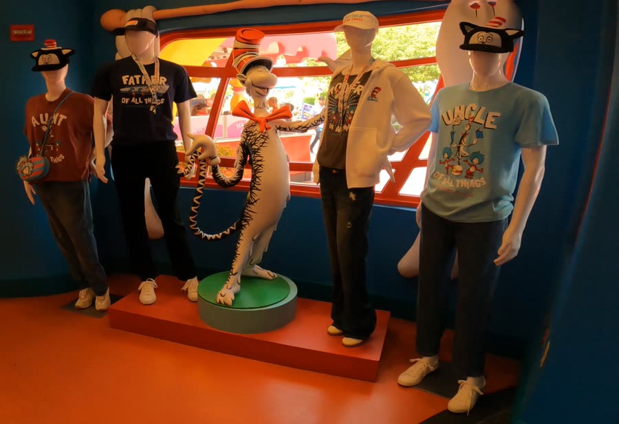 Cat in the Hat merchandise display with the 'of All Things' apparel line in Seuss Landing